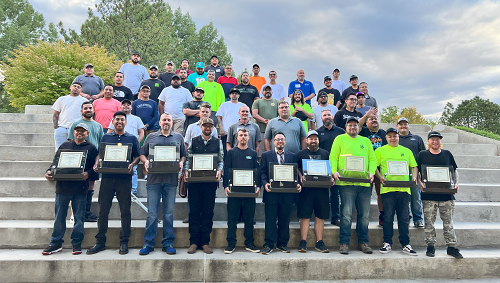 Apprentice graduates and family at UGA BBQ